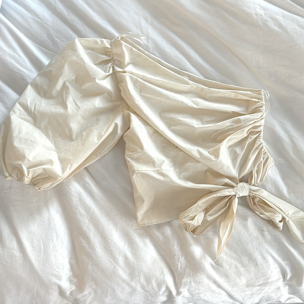 one shoulder top with bow tie at bottom